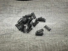Pružina vypouštěče zásobníku Beretta 71